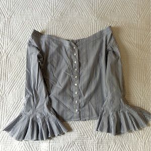 Off the shoulder blue striped blouse.